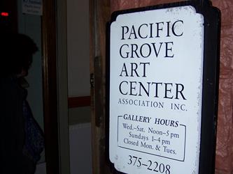 plaque reading pacific grove art center